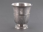 A silver tulip-shape beaker