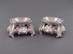 A pair of silver salt cellars