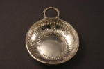 A silver wine taster