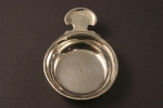 A silver wine taster