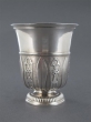 A silver tulip-shape beaker