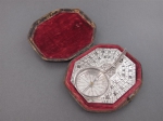 An octogonal silver sundial