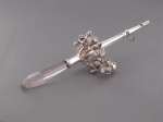 A silver rattle