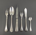 A silver cutlery service by PUIFORCAT