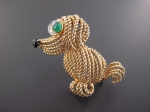 A gem-set dog brooch